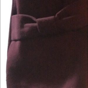 Great maroon jacket with cute bow details